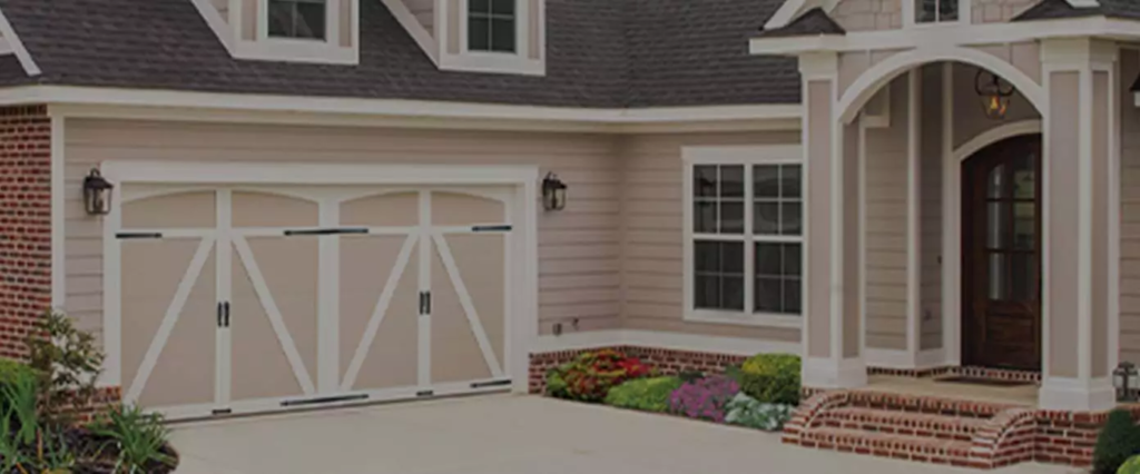 Technician troubleshooting a garage door in Concord.